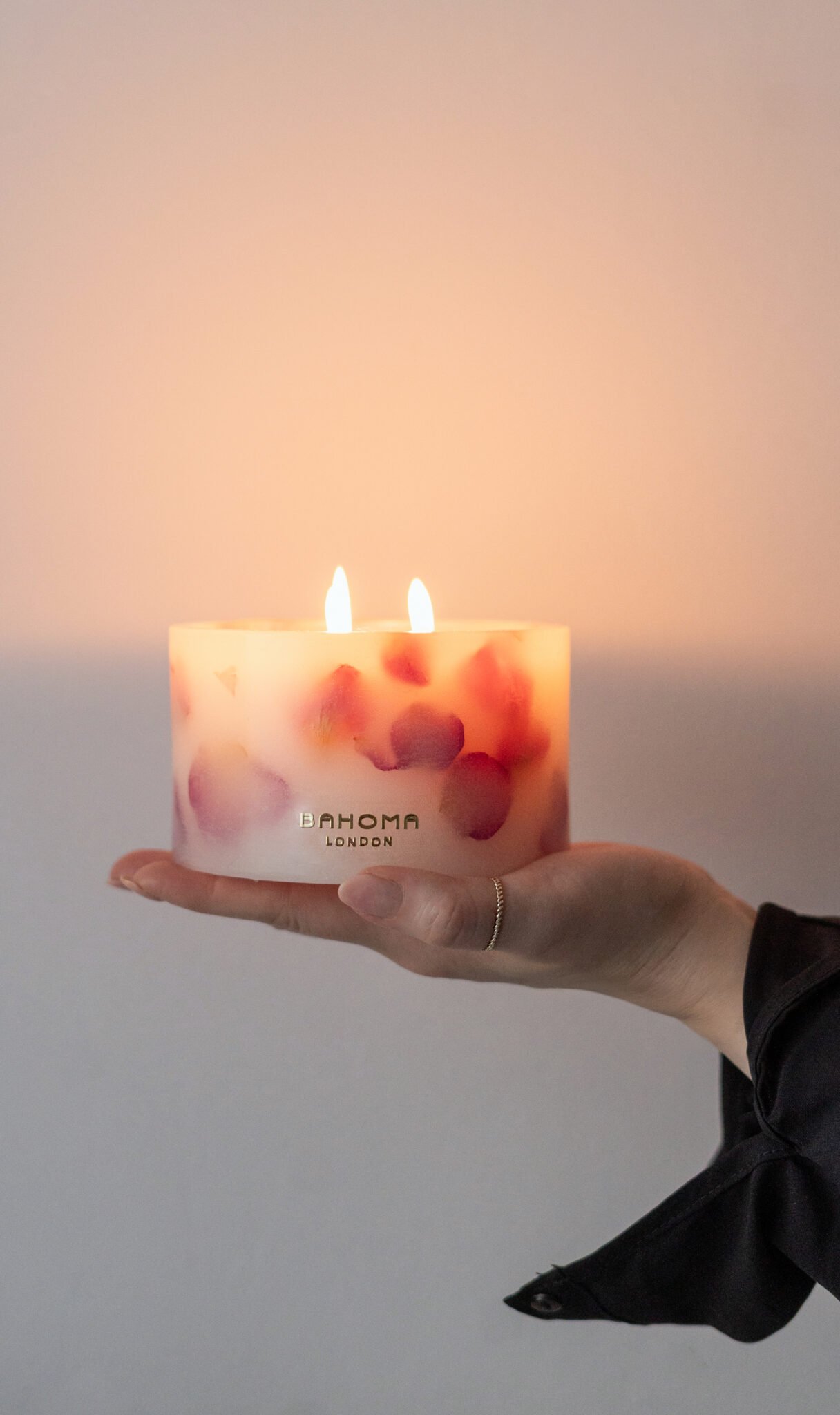 Lit up Velvet Rose - Small Pillar Candle made with real rose petals held in hand