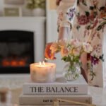 Cherry Blossom Scented Small Pillar Candle in a bright, airy room setting.