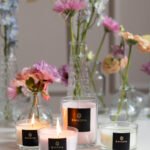 Wild Heather & Oakwood - Set of 3 Compact Candles in Gift box. Image showing a selection of compact candles in lifestyle setting.