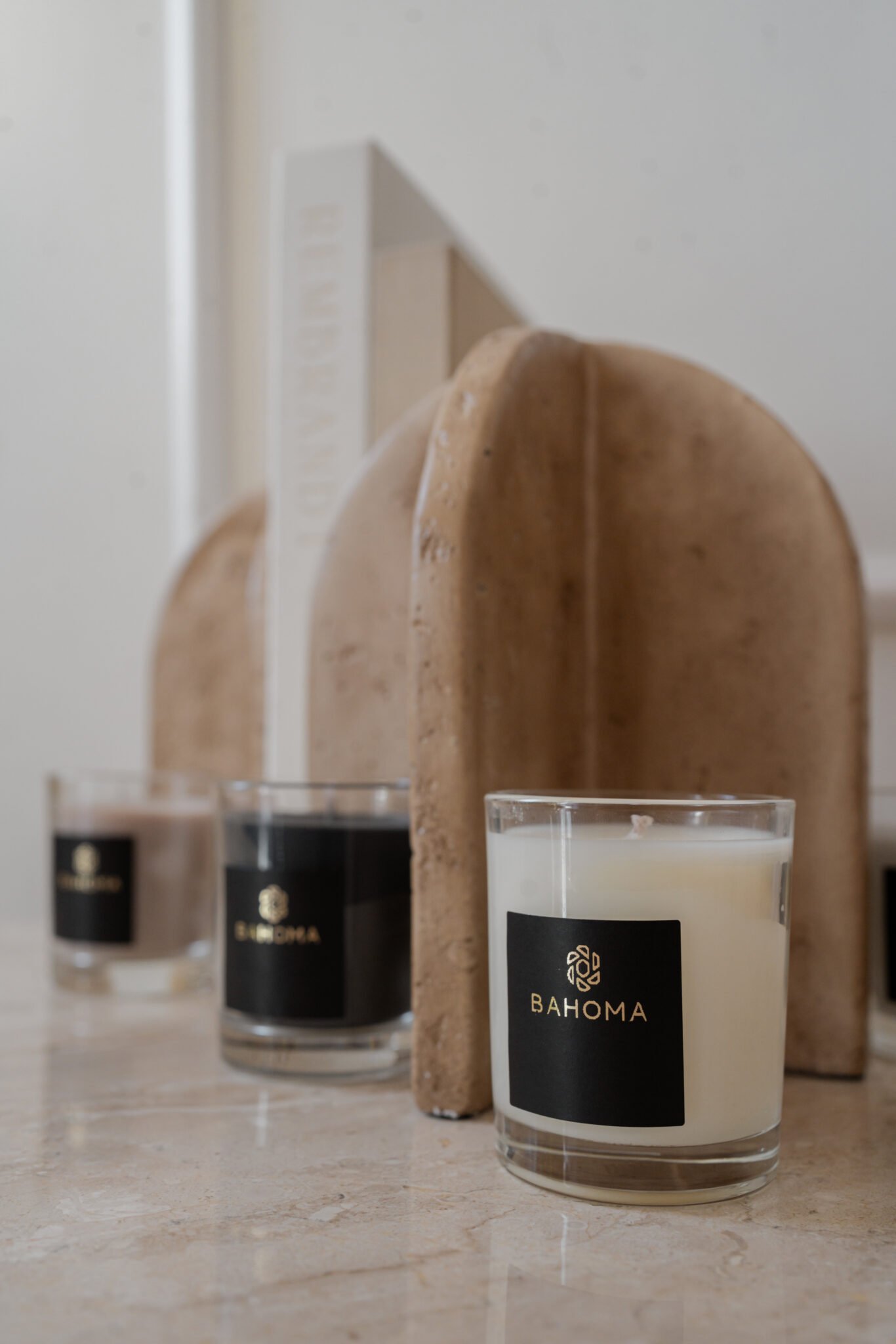 Bahoma Set 3 x Travel Candle in a box lifestyle display; luxury scented candle gift set for home decor and travel.
